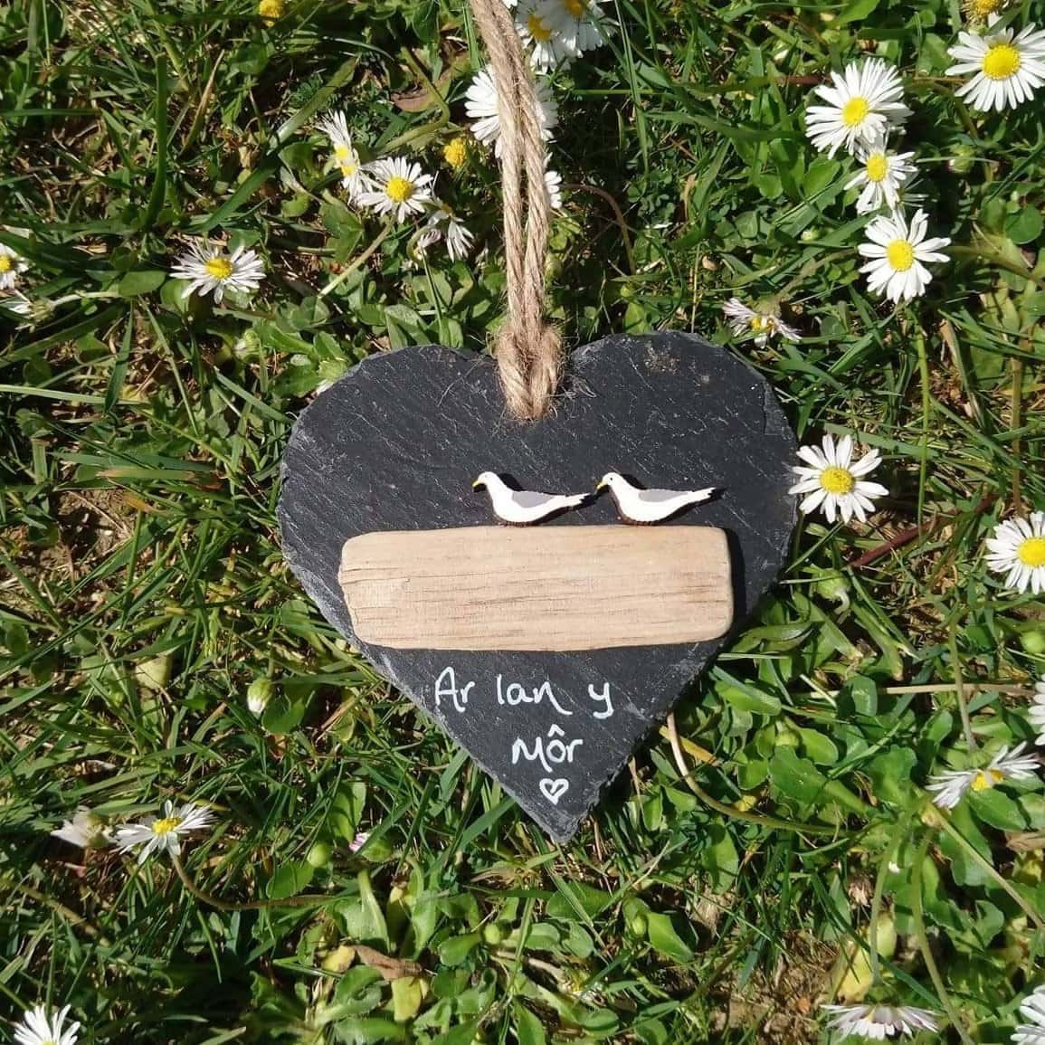 Handpainted gulls on slate