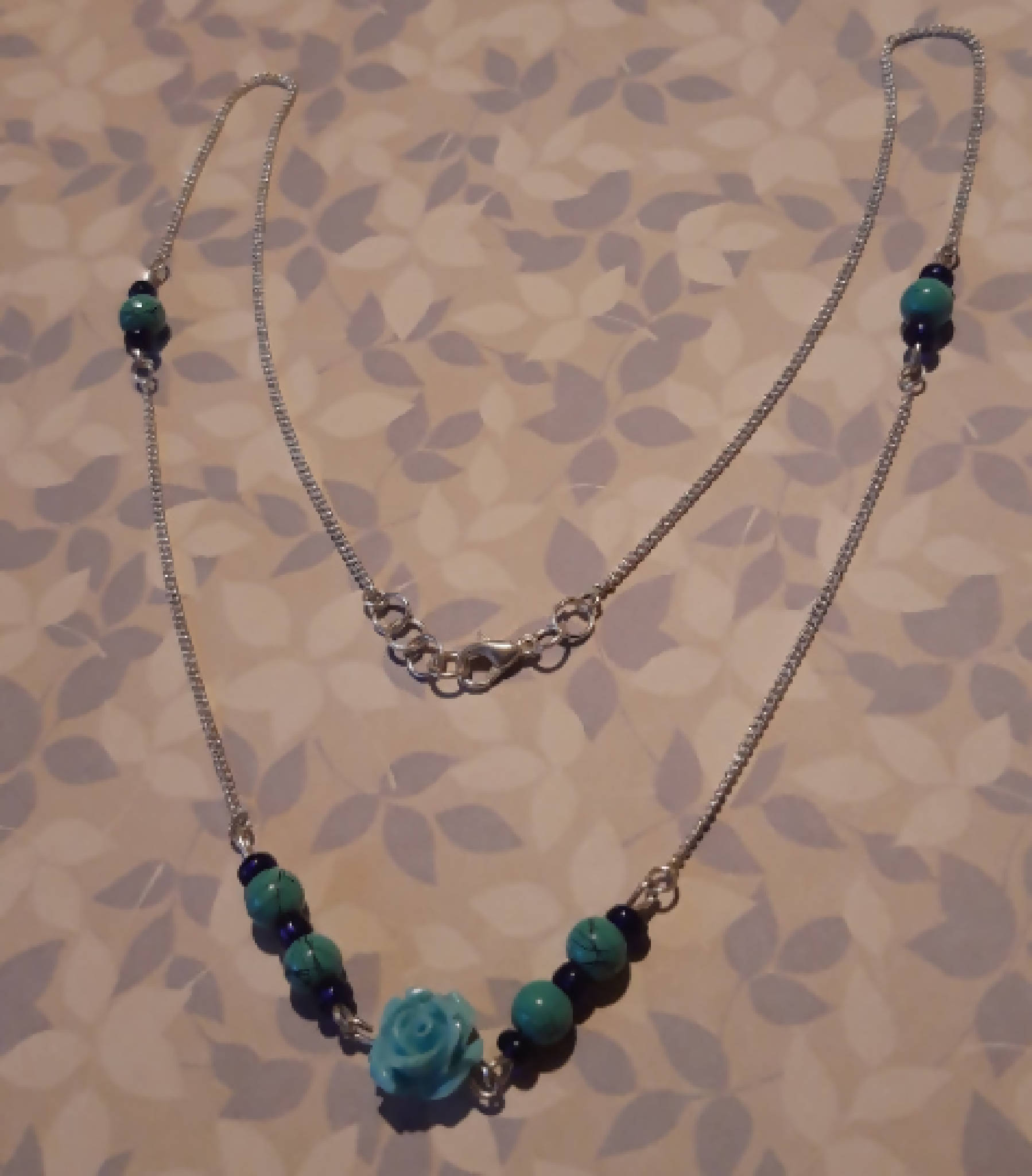 Teal rose necklace