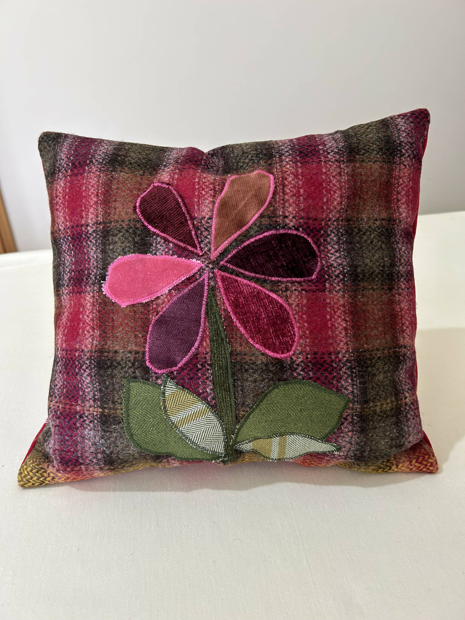 Check wool flower cushion