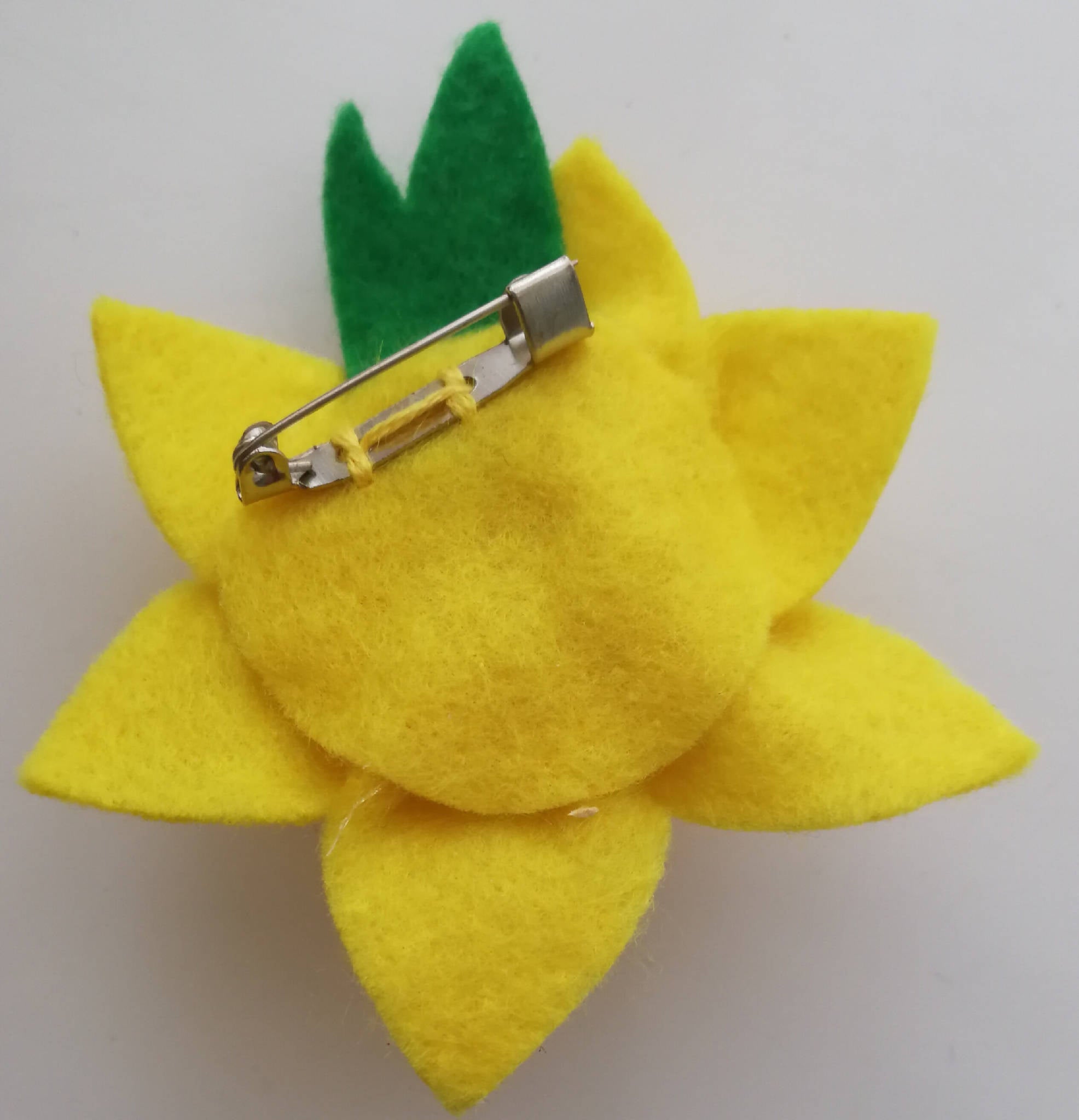 Six Daffodil Brooches