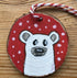 Wood cookie Christmas decorations bear in snow