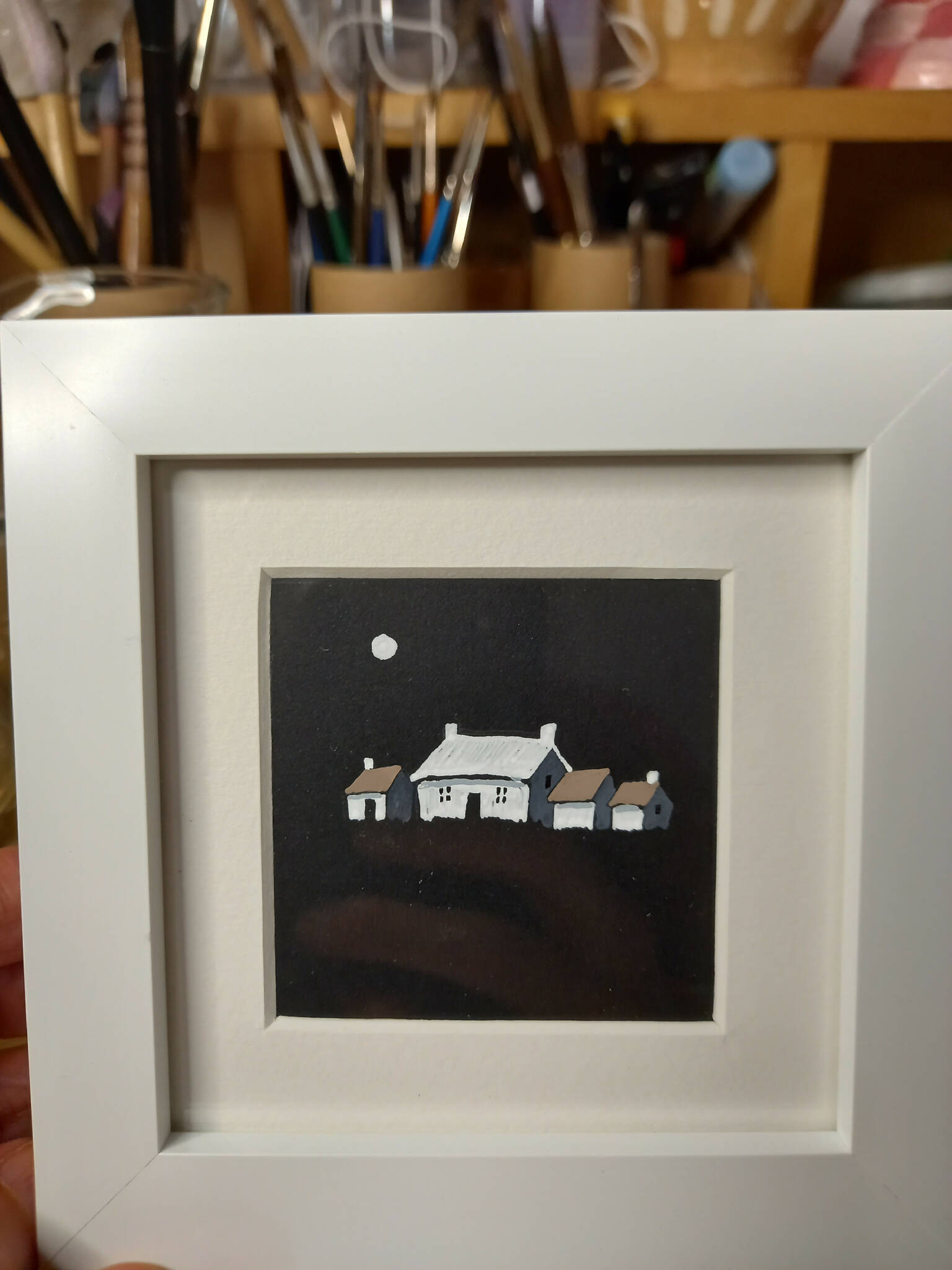 Welsh white washed moonlit cottage