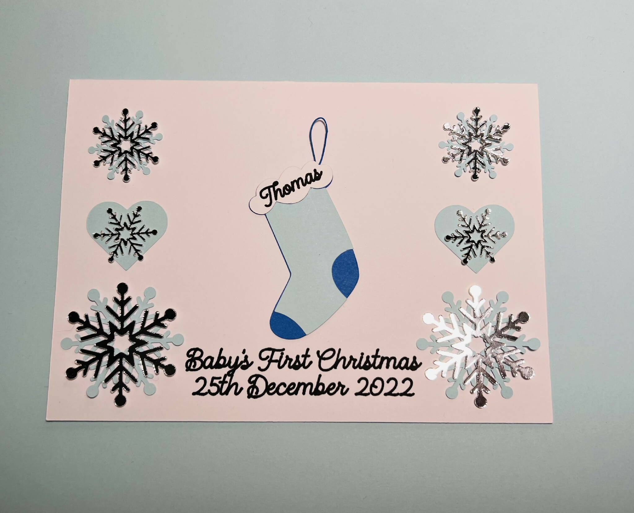 Baby 1st Christmas card snowflake & hearts