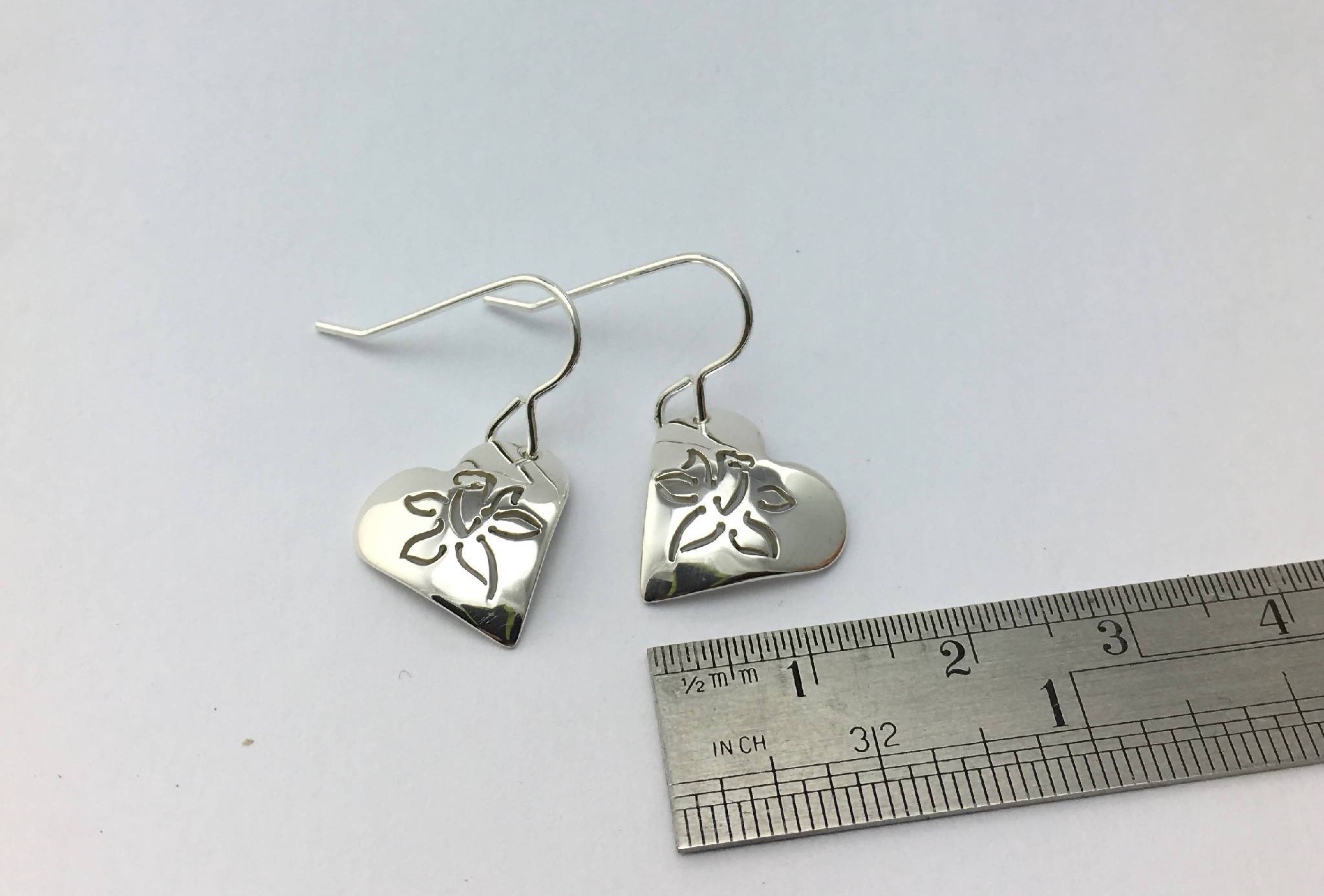 Heart shaped short drop earrings with single Daffodil design