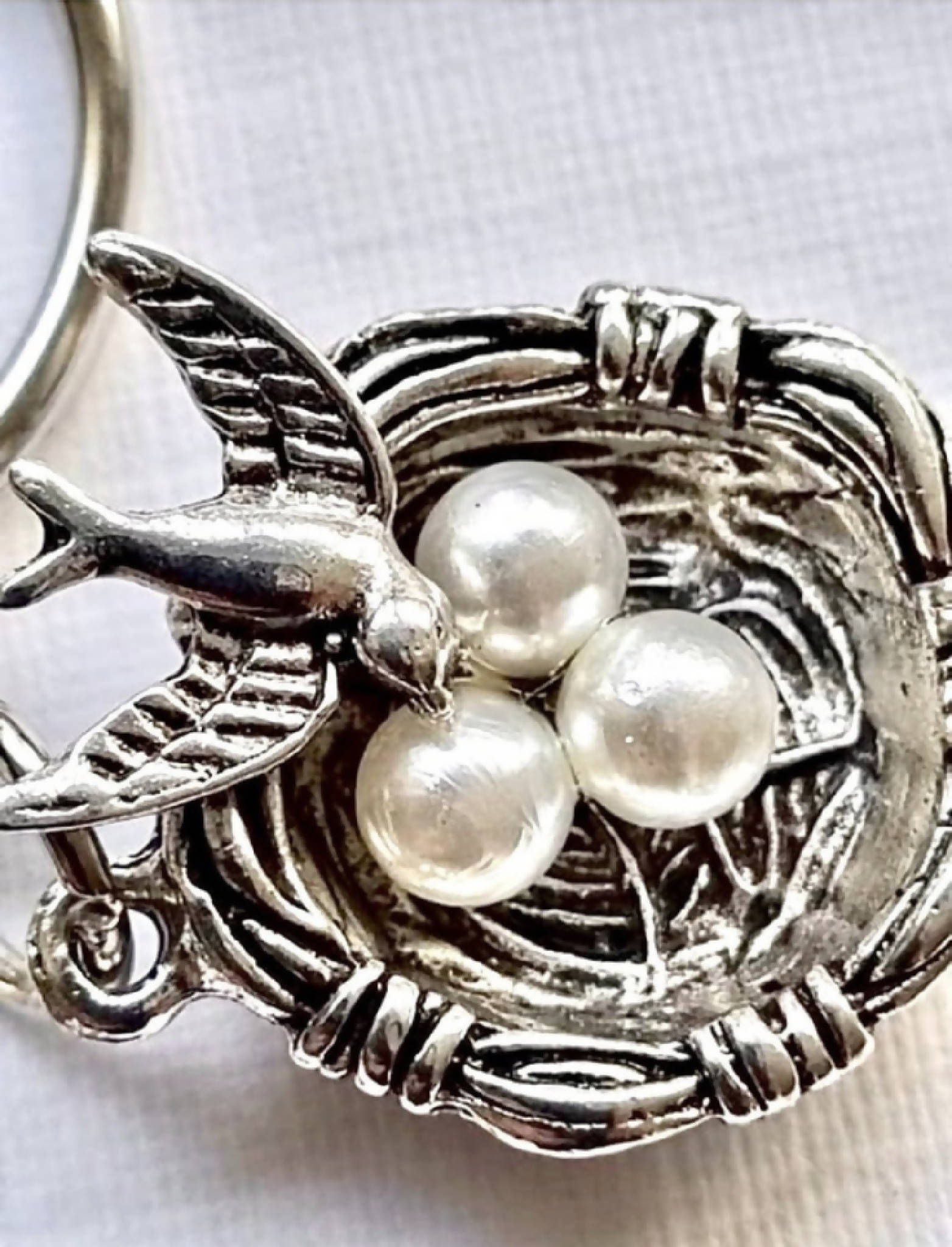 Beautiful silver tone bird and nest keyring/bag charm. Gorgeous little gift for new parent/s.