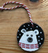 Wood cookie Christmas decorations bear in snow