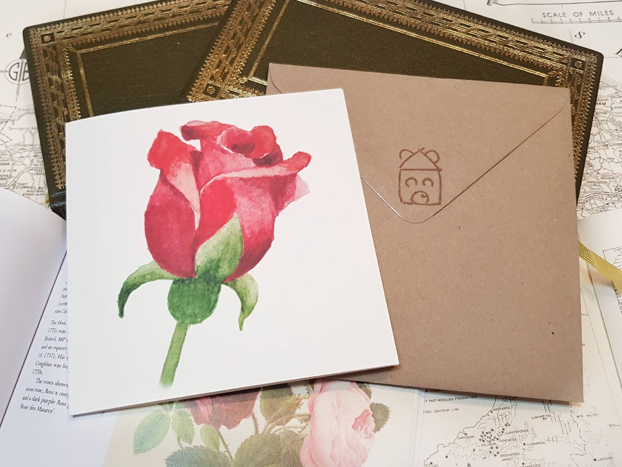 Greetings card of watercolour print of a red rose