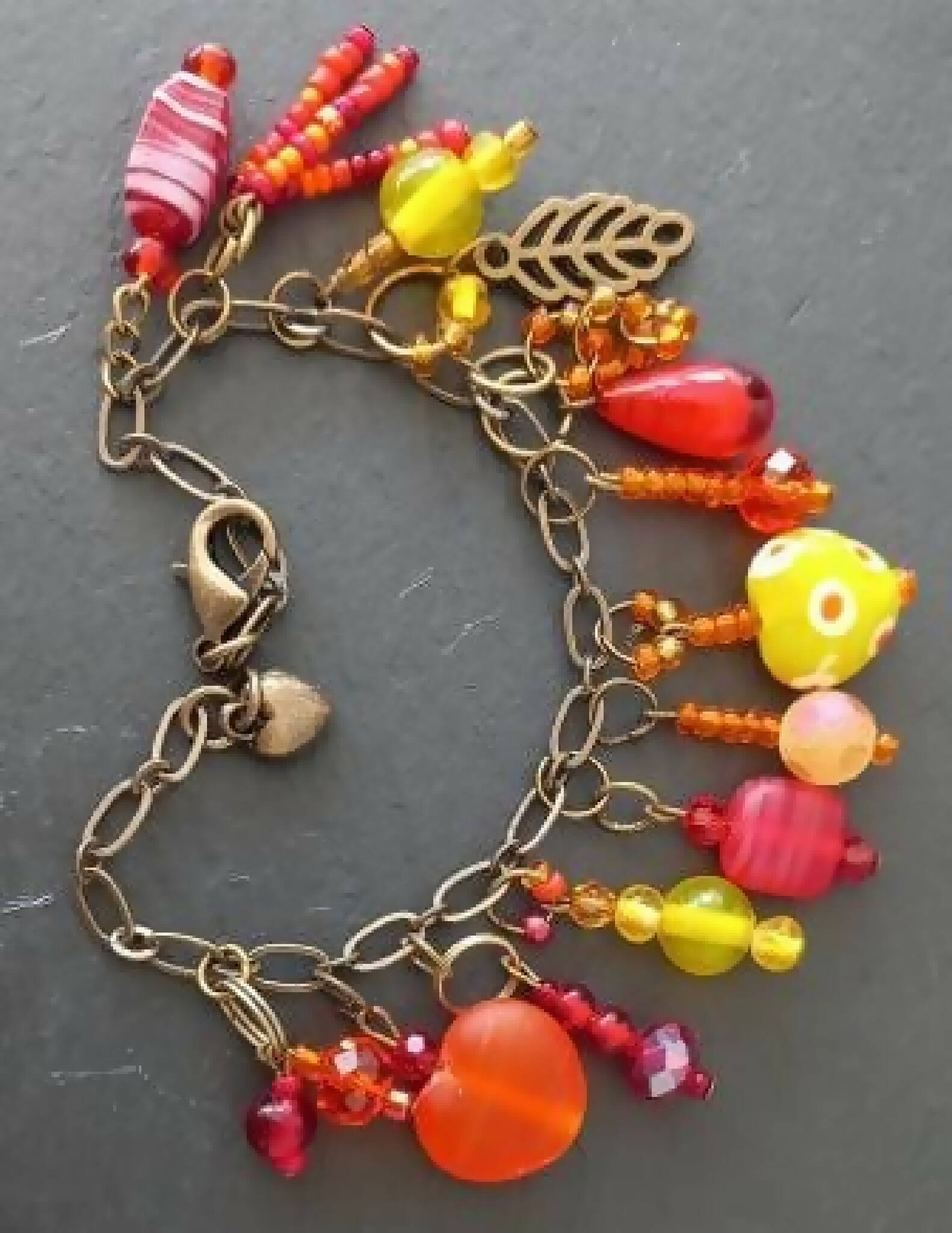 Charm Bracelet in Reds Yellows and Oranges