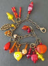 Charm Bracelet in Reds Yellows and Oranges